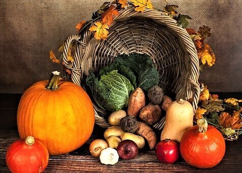 A Thanksgiving dinner table with vegetables